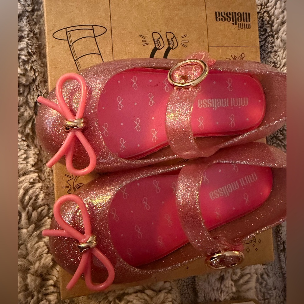 2 pairs of Mini Melissa Sparkly Bow Shoes Gently Used